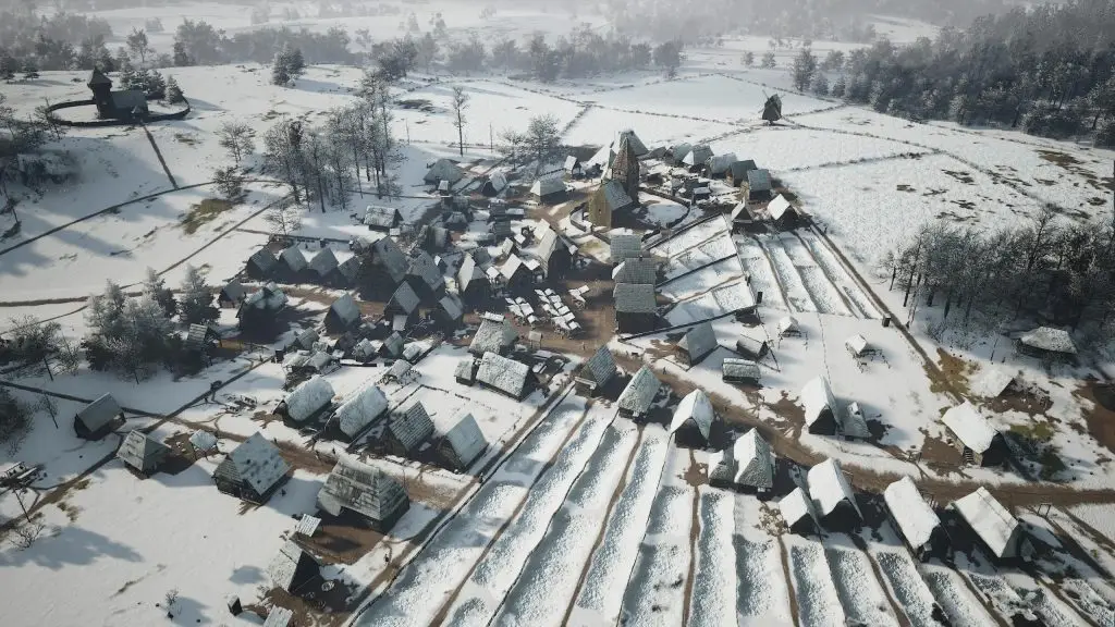 Перша зима в Manor Lords — зимове поселення під снігом